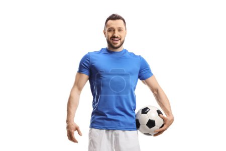 Foto de Jugador de fútbol con una pelota bajo el brazo aislada sobre fondo blanco - Imagen libre de derechos