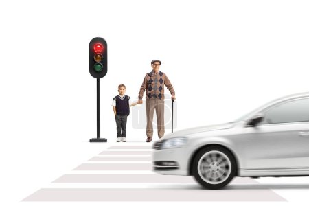 Photo for Elderly man and a schoolboy waiting to cross street at traffic lights isolated on white background - Royalty Free Image