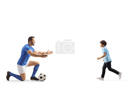Photo for Football player waiting to hug a boy isolated on white backgroun - Royalty Free Image