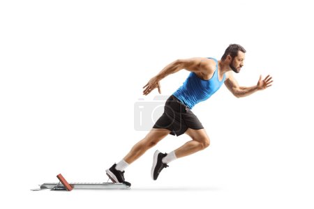 Photo for Full length profile shot of a male athlete on starting blocks isolated on white background - Royalty Free Image