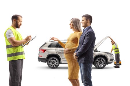 Photo for Young couple with a car problem talking to a road assistance agent isolated on white background - Royalty Free Image