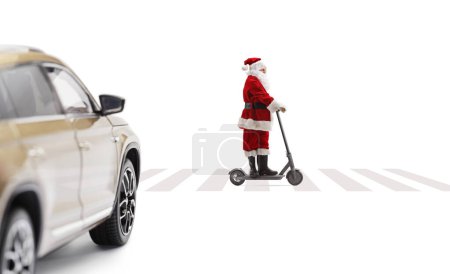 Photo for Santa Claus riding an electric scooter at a pedestrian crossing isolated on white background - Royalty Free Image