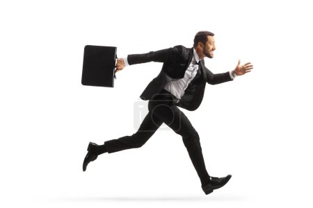 Photo for Full length profile shot of a businessman running fast and carrying a briefcase isolated on white background - Royalty Free Image