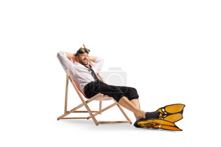 Photo for Businessman with snorkelling fins and mask sitting on a bech chair isolated on white background - Royalty Free Image