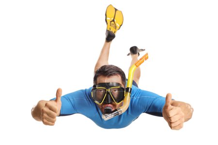 Foto de Man in a suit snorkeling with fins and a mask and gesturing thumbs up isolated on white background - Imagen libre de derechos