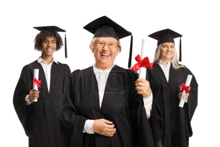 Téléchargez les photos : Graduate students and an elderly woman holding certificates and smiling isolated on white background - en image libre de droit