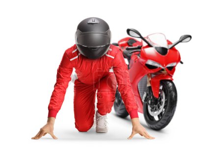 Téléchargez les photos : Motorbike racer in a set position preparing for a run isolated on white background - en image libre de droit