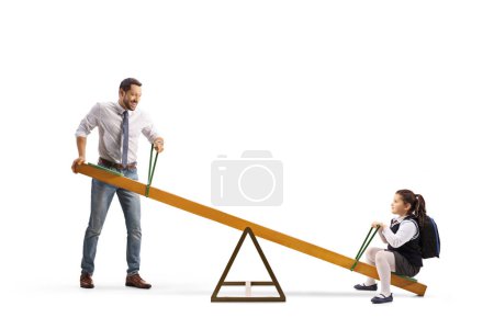 Photo for Father lifting a daughter on a seesaw isolated on white background - Royalty Free Image