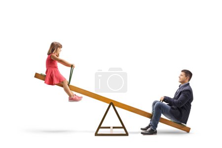 Photo for Man and a little girl on a seasaw isolated on white background - Royalty Free Image