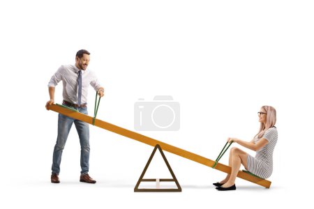 Photo for Man lifing a young woman on a seesaw isolated on white background - Royalty Free Image