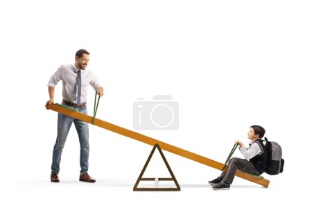 Photo for Man lifiting a boy on a seesaw isolated on white background - Royalty Free Image