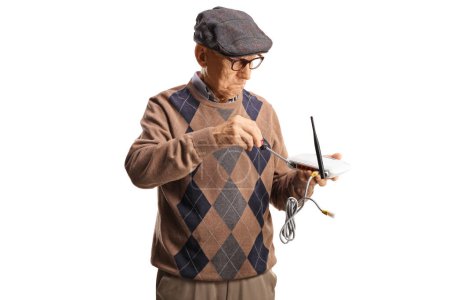Foto de Hombre mayor fijando un router aislado sobre fondo blanco - Imagen libre de derechos