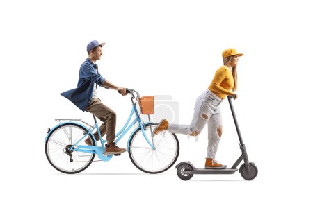 Photo for Young female riding an electirc scooter and guy riding a bicycle isolated on white background - Royalty Free Image