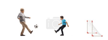 Photo for Boy and grandfather playing football isolated on white background - Royalty Free Image