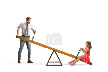 Photo for Father swinging daughter on a seesaw isolated on white background - Royalty Free Image