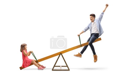 Photo for Little girl and a teenager playing on a wooden seesaw isolated on white background - Royalty Free Image