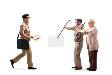 Photo for Mailman delivering a letter to an elderly man and woman isolated on white background - Royalty Free Image