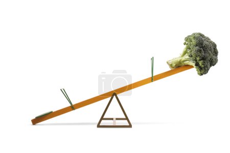 Photo for Studio shot of a healthy vegetable broccoli on a seesaw isolated on white background - Royalty Free Image