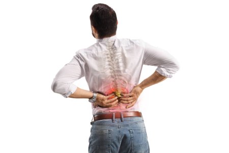 Foto de Vista trasera de un hombre que sostiene la zona inflamada de la parte inferior de la espalda con el hueso visible de la columna vertebral aislado sobre fondo blanco - Imagen libre de derechos