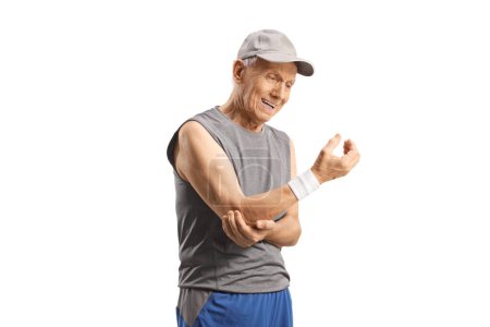 Photo for Elderly man in sportswear holding painful elbow isolated on white background - Royalty Free Image
