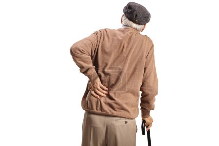 Foto de Vista trasera de un anciano con dolor de espalda aislado sobre fondo blanco - Imagen libre de derechos