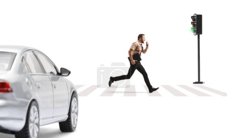 Photo for Full length profile shot of a security officer running in front of a car and using a walkie talkie isolated on white background - Royalty Free Image
