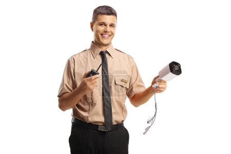 Photo for Young security guard holding a walkie talkie and a surveillance camera isolated on white background - Royalty Free Image