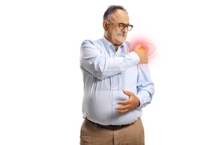 Photo for Mature man with pain in shoulder holding a red spot isolated on white background - Royalty Free Image