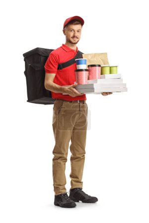 Photo for Full length portrait of a guy delivering takeaway food isolated on white background - Royalty Free Image
