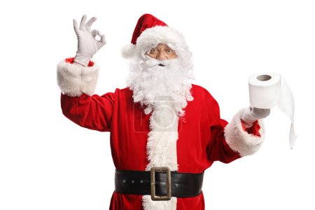 Photo for Santa claus holding a toilet paper roll and gesturing good sign isolated on white background - Royalty Free Image