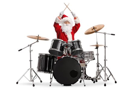 Téléchargez les photos : Joyeux Père Noël claus jouer les tambours isolés sur fond blanc - en image libre de droit