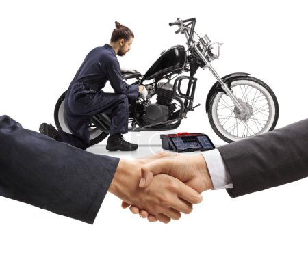 Photo for Men shaking hands in front of a mechanic fixing a motorbike isolated on white background - Royalty Free Image