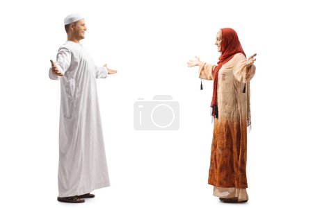 Photo for Muslim man meeting a young muslim woman isolated on white background - Royalty Free Image