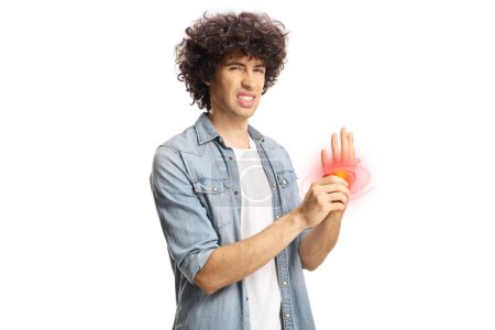 Photo for Young man holding his painful inflamed palm with red circles isolated on white background - Royalty Free Image