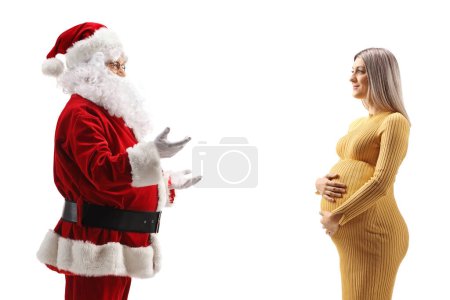 Téléchargez les photos : Profil de santa claus parlant à une femme enceinte isolée sur fond blanc - en image libre de droit