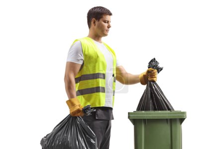 Photo for Waste collector taking a bag from a bin isolated on white background - Royalty Free Image