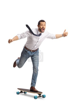 Photo for Excited man on a skateboard riding fast isolated on white background - Royalty Free Image