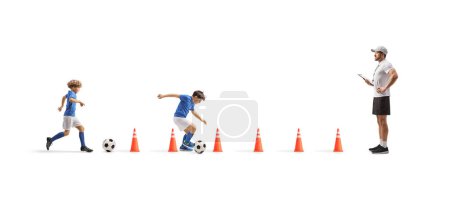 Photo for Boys at a football camp training aguility with coach isolated on white background - Royalty Free Image
