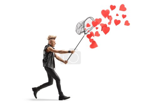 Téléchargez les photos : Punk courir et attraper des cœurs avec un filet isolé sur fond blanc - en image libre de droit