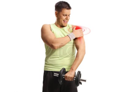 Photo for Man lifting weights at home and holding his inflamed red shoulder, pain and health issues concept isolated on white background - Royalty Free Image