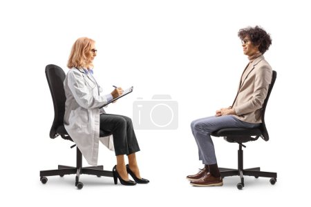 Photo for Professional man sitting and talking to a female doctor isolated on white background - Royalty Free Image