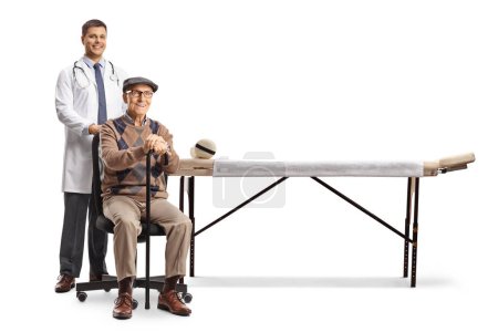 Physical therapist and an elderly male patient sitting in a chair isolated on white background