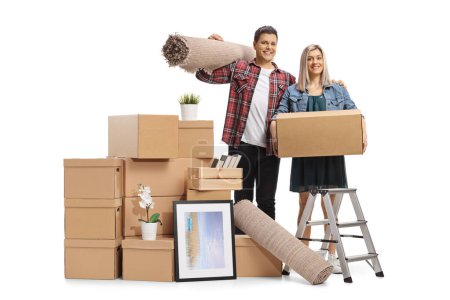 Photo for Couple with a cardboard boxes packing for home removal isolated on white background - Royalty Free Image