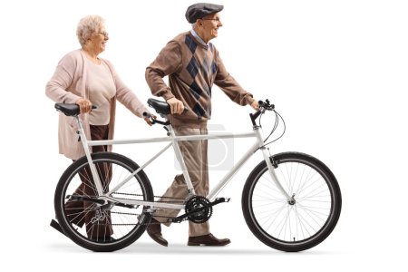 Photo for Elderly man and woman pushing a tandem bicycle isolated on white background - Royalty Free Image