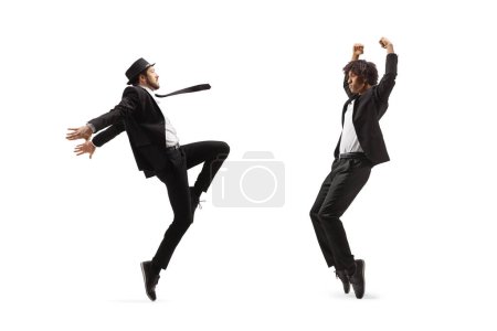 Full length shot of two male dancers dancing isolated on white background
