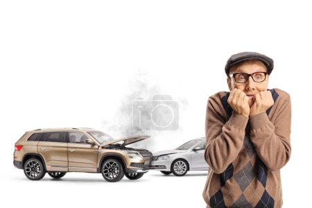 Photo for Terrified elderly man with eyes wide open scared from a car accident isolated on white background - Royalty Free Image