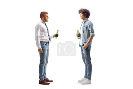 Photo for Full length profile shot of a young man with curly hair holding a bottle of beer and talking to a friend isolated on white background - Royalty Free Image