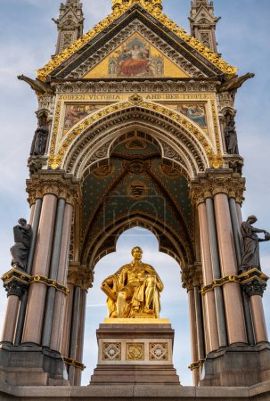 Photo for London, UK: The Albert Memorial in Kensington Gardens in memory of Prince Albert, the husband of Queen Victoria. Detail of the statue and canopy. - Royalty Free Image