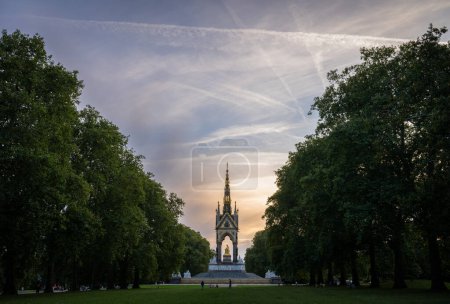 Photo for London, UK: The Albert Memorial in Kensington Gardens in memory of Prince Albert, the husband of Queen Victoria. Wide angle view from the east at dusk. - Royalty Free Image