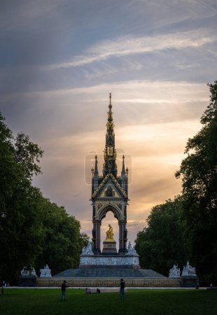 Photo for London, UK: The Albert Memorial in Kensington Gardens in memory of Prince Albert, the husband of Queen Victoria. Portrait view from the east at dusk. - Royalty Free Image